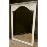 A contemporary light blue painted rectangular mirror, arched bevelled glass, 80cm x 55cm.