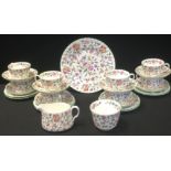A Minton Haddon Hall pattern tea service, for eight, comprising teacups, saucer, side plates,