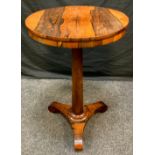 An early Victorian rosewood occasional table, circular top, spreading octagonal column, triform