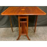 An Edwardian mahogany and satinwood crossbanded Sutherland table, inlaid with batwing patera, 67cm