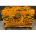 A 20th century Chinese laquered chest, decorated with ducks and lily pads, 61cm high.