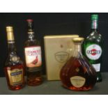 Courvoisier XO cognac, 750ml, presentation boxed; Martell V S, 750ml, Famous Grouse Whisky, 1ltr;