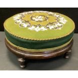 A Victorian mahogany circular foot stool, woolwork and beaded top, 33cm diam, c.1870