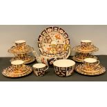 A Royal Crown Derby 2451 pattern tea service, for six, comprising teacups, saucers, side plates,