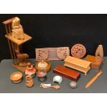 An A Aspin Canadian carved wooden figure; tribal gourd; adjustable book racks; boxes etc.