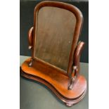 A Victorian mahogany toilet mirror, inverted serpentine base, 58cm high, c.1860