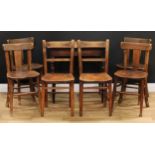 A late Victorian oak side table, rounded rectangular top with moulded edge, tapered cylindrical