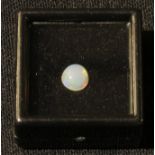 Loose Gem Stones - an Australian opal, polished circular cabochon, 0.70cts