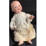Toys & Juvenalia - an Armand Marseille (Germany) bisque head and painted composition bodied doll,