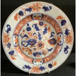A Chinese Imari side plate, painted with scrolling foliage, 23cm diam, c.1770