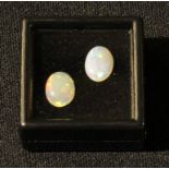 Loose gem Stones - two Australian opals, polished oval cabochons, total 1.99cts