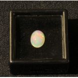 Loose gem Stones - an Australian opal, polished oval cabochon, 1.34cts