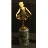 After Priess, a bronze Art Deco type figure, cylindrical marble base, 32cm high