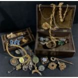 Costume Jewellery - an Edwardian jewellery box containing gilt metal brooches, necklaces; etc