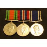 World War II medals, a set of three 1939 - 1945 Defense medal, Service medal, For Exemplary Police