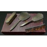 A silver four piece dressing table set, boxed, Birmingham 1951