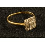 A diamond ring, set square with nine diamond, gold shank, 2g