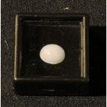 Loose gem Stones - an Australian opal, polished oval cabochon, 1.63cts