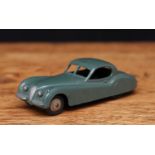 Dinky Toys 157 Jaguar XK120, drab green body, fawn ridged hubs, unboxed, this example is casted with