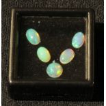 Loose Gem Stones - five Australian opals, polished circular and oval cabochons, total 1.63cts