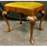 A Victorian mahogany piano stool, carved knee. ridged hoof foot, green upholstered seat, 47cm
