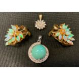 A pair of diamond and opal cluster clip on earrings, yellow metal mounts, stamped 585, 5.5g gross; a