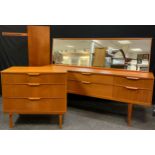 A three piece teak Austin suite bedroom suite, three drawer chest, 80cm wide, long dressing table,