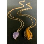 A 9ct gold tigers eye teardrop pendant necklace, 9ct gold mount and chain, 6.7g gross; a diamond and