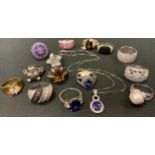 A 925 silver panther head ring; others CZ, floral tanzanite effect ring and pendant necklace, etc (