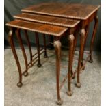 A 19th century mahogany nest of three tables. Scalloped beading, carved cabriole legs, ball and claw