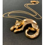 An Italian 14ct gold panther pendant necklace, stamped 14k 585, Birmingham import marks, suspended