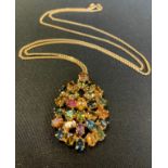 A multi gem open cast cluster pendant necklace, 9ct gold mount and chain, Sheffield import marks,