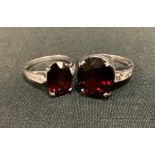 A 9ct gold garnet dress ring, another, 9ct white gold shanks, Birmingham marks, Size R, 12g gross (