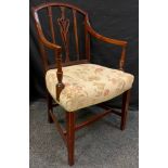 A 19th century mahogany open arm elbow chair, pierced lyre splat, floral upholstered seat, inlaid