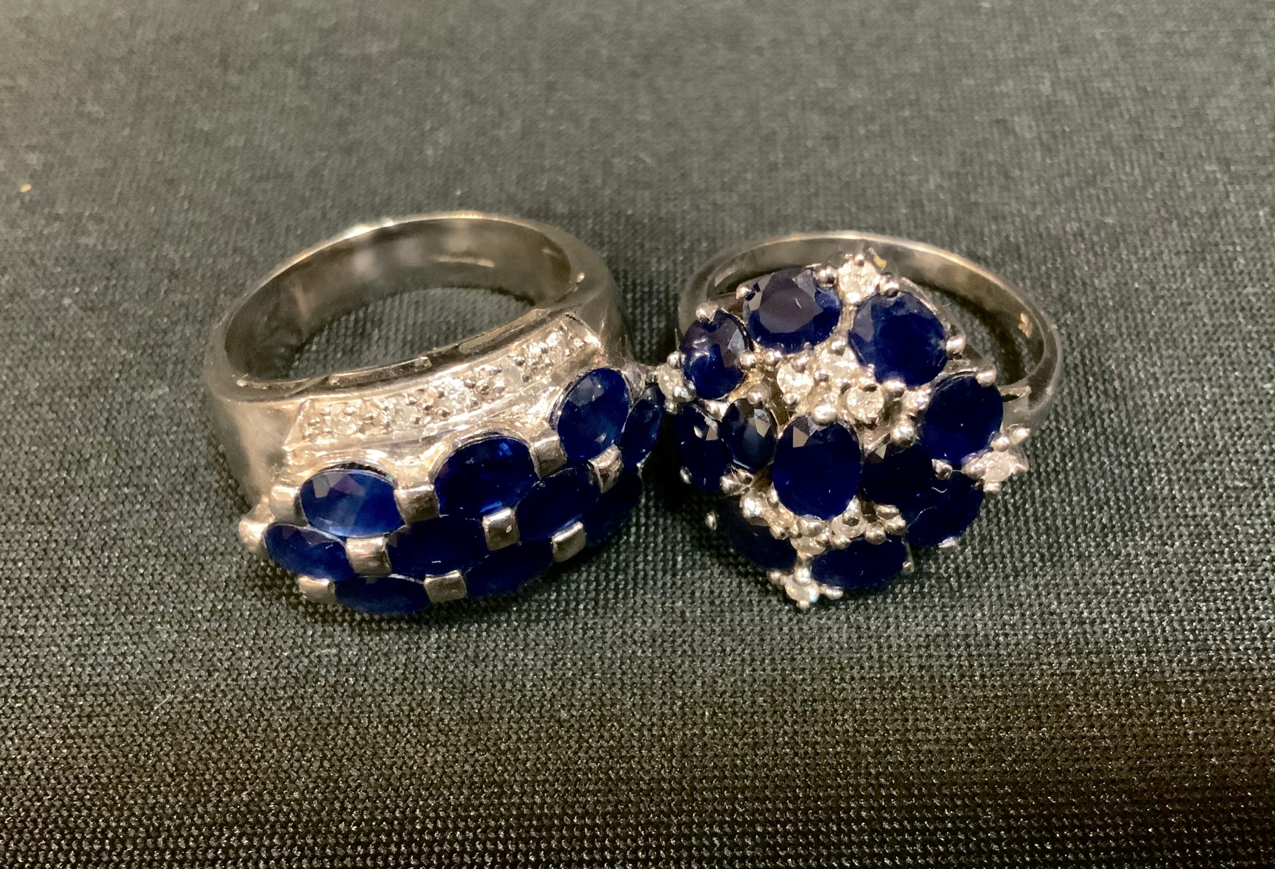 A gems TV sapphire and diamond cluster ring, ten oval brick set blue sapphires flanked by five round