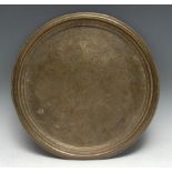 An Indian brass circular tray, the field engraved with Vishnu and other deities, 39cm diam, c.1900