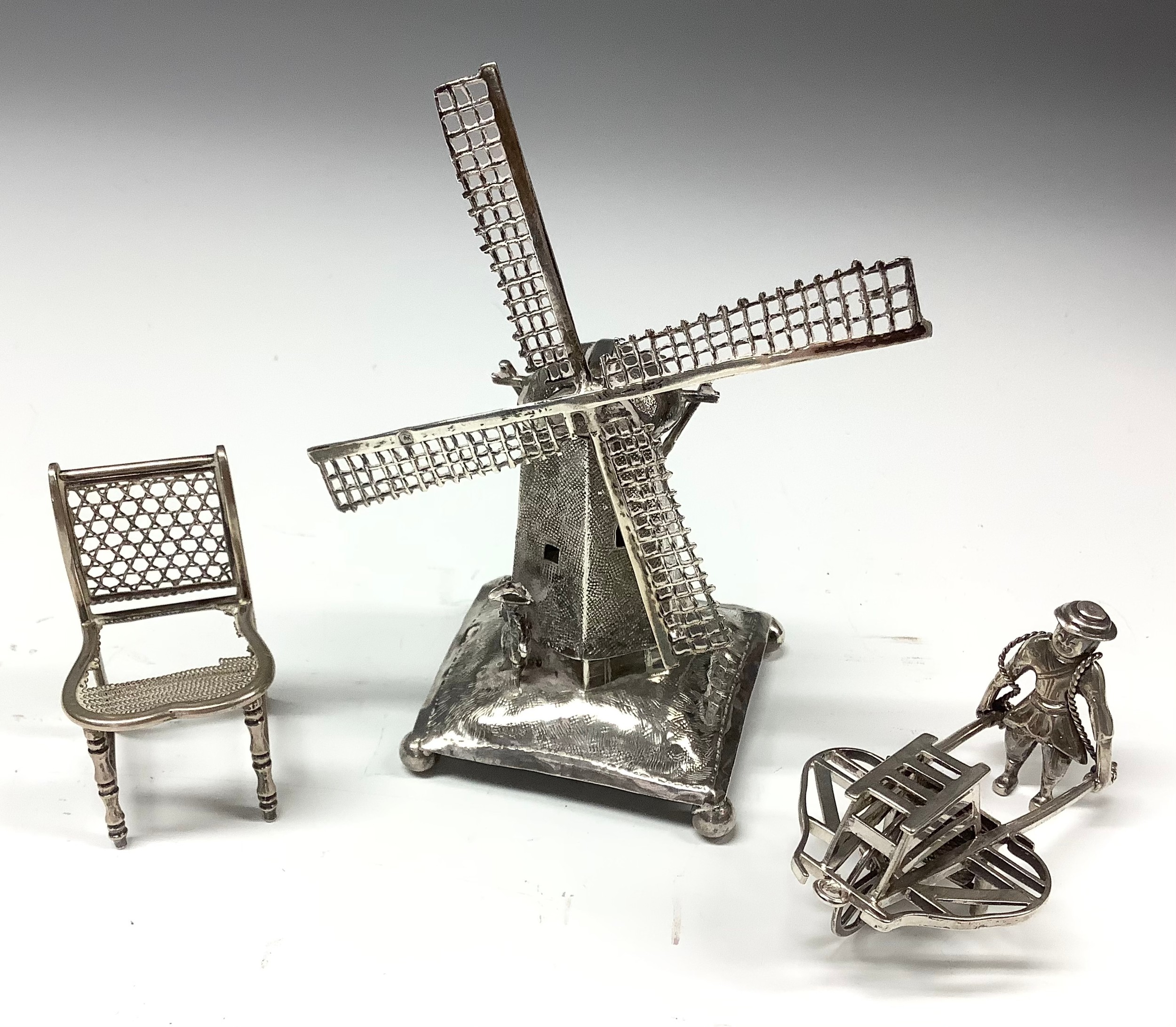 A Dutch silver toy novelty miniature windmill, 11.5cm high, import mark for Sheffield 1907; another,