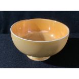 A Moorcroft orange lustre pedestal bowl, 8cm diameter, impressed marks, c.1920