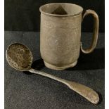 A Victorian silver christening mug, 10cm, Birmingham 1855; a George IV silver sugar sifting spoon,