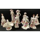 A Staffordshire Fenton floral printed figure, Kate, others, Marie, Manhattan New Yorker, Madeline,