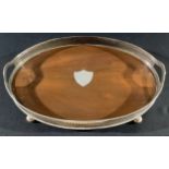 A large oval silver plated and mahogany gallery tray, 56cm long