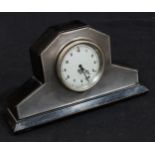 An Art Deco silver mantel clock, 7cm silvered dial inscribed Smiths H-91551, car dashboard type