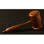 Treen - a mahogany novelty money box, as an oversized auctioneers gavel, 28cm long