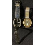 A Seiko vintage gentleman's wristwatch; another (2)