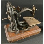 A 19th century C-frame sewing machine, by Willcox & Gibbs