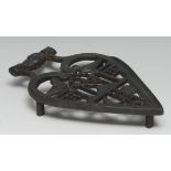 Masonic and Friendly Society Interest - a cast iron trivet, cast with clasped hands, birds, initials