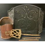 A copper coal scuttle; a black wrought iron fire screen; etc