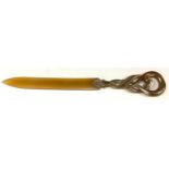 An Art Nouveau letter opener, ornate brass twist handle, horn blade, 24cm