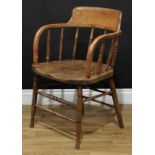 A 19th century elm desk chair, of Windsor construction, turned legs and spindles, 78cm high, 56cm