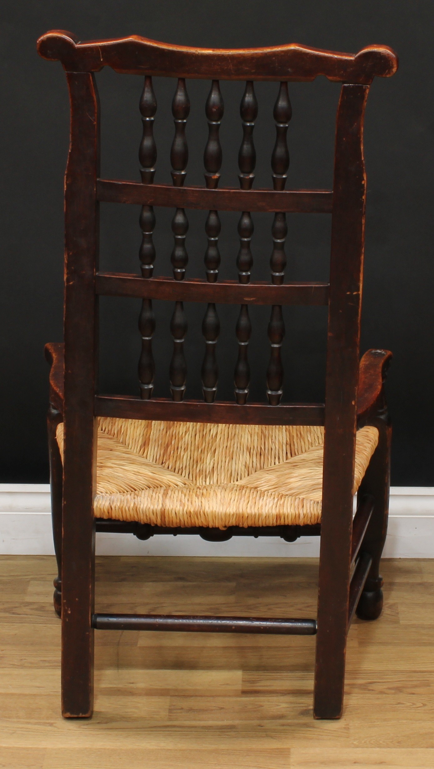 A 19th century rush seated spindle-back elbow chair, turned front stretcher, 96cm high, 52cm wide, - Bild 4 aus 4